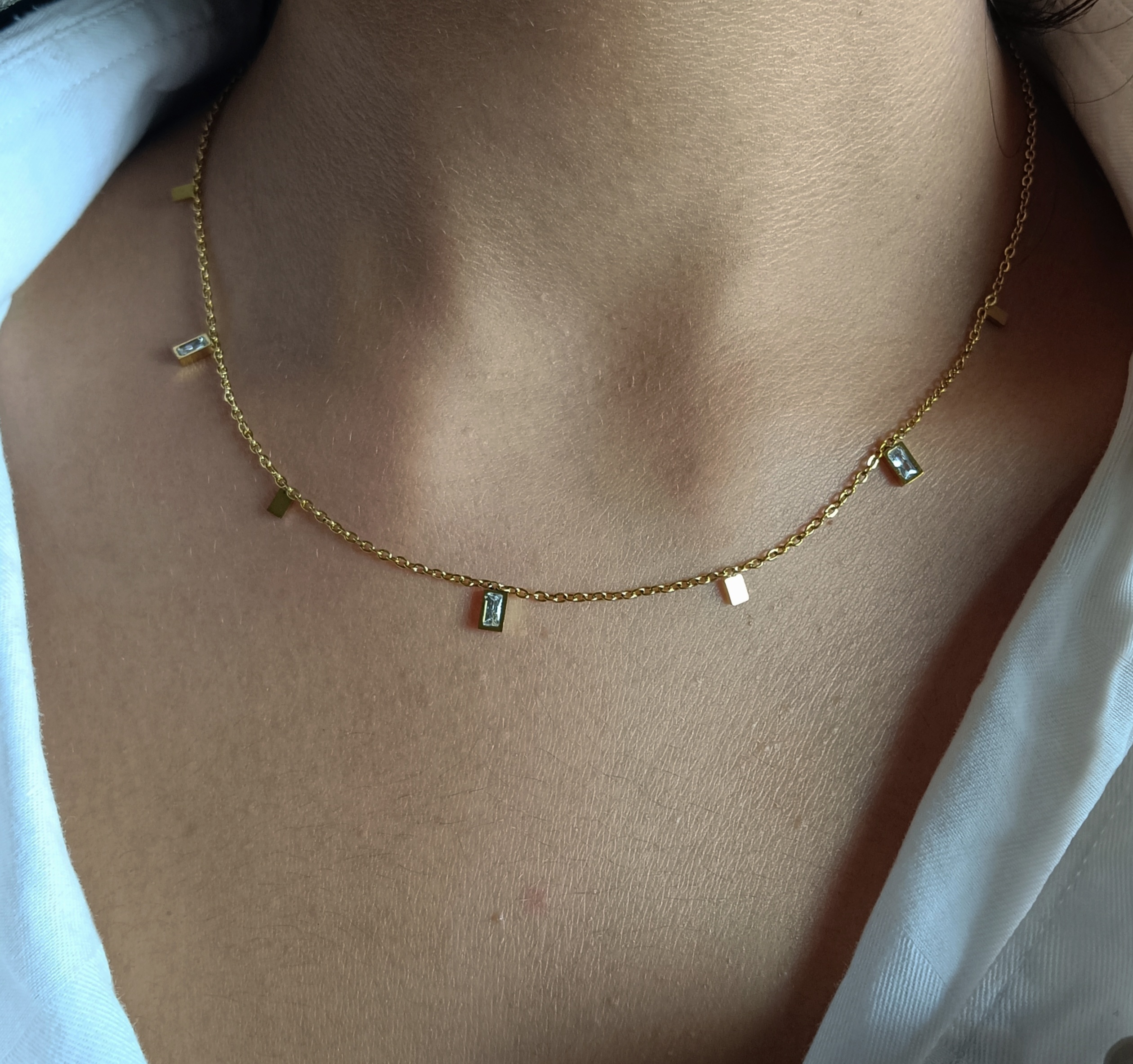 Delicate gold necklace with small rectangular charms – minimalist women's jewelry